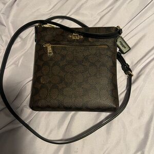 Brand new crossbody. Strap wasnt long enough for me.